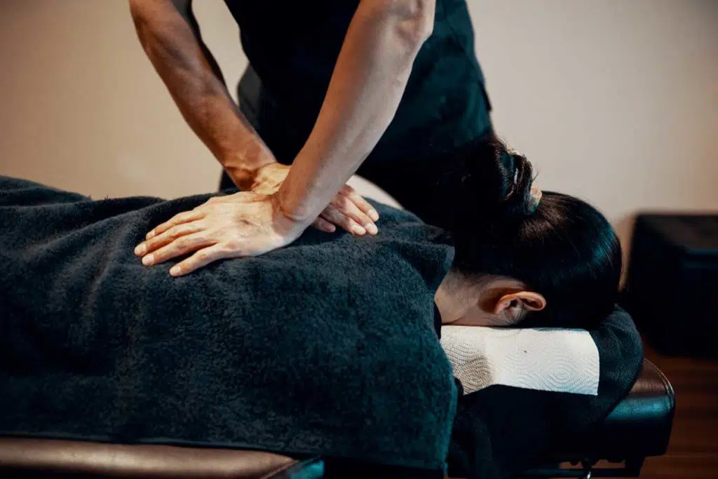 Chiropractor doing chiropractic treatment to the patient who suffers from personal injury