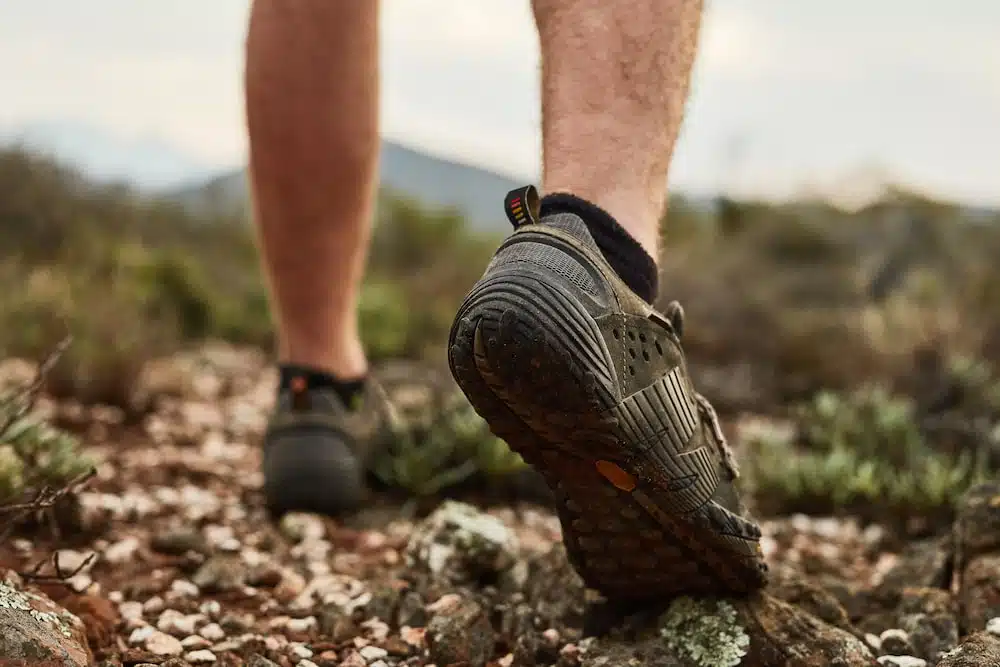 hiker experiencing pain relief and improved mobility after plantar fasciitis treatment in burbank
