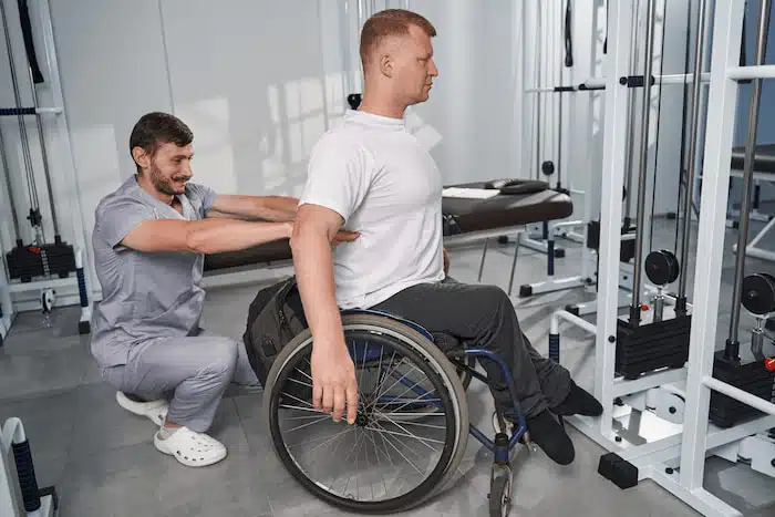 Chiropractic Care After a Personal Injury  performed on a man on a wheel chair