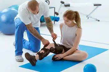 Myofascial Release Therapy for Auto Accident Injury on a teenage patient with leg braces