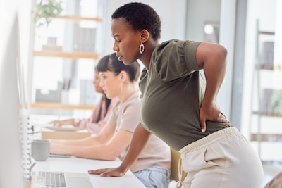 woman with bad posture experiencing back pain