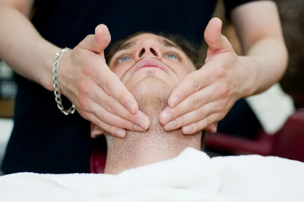 patient getting an assessment for his TMJ Treatment in Burbank