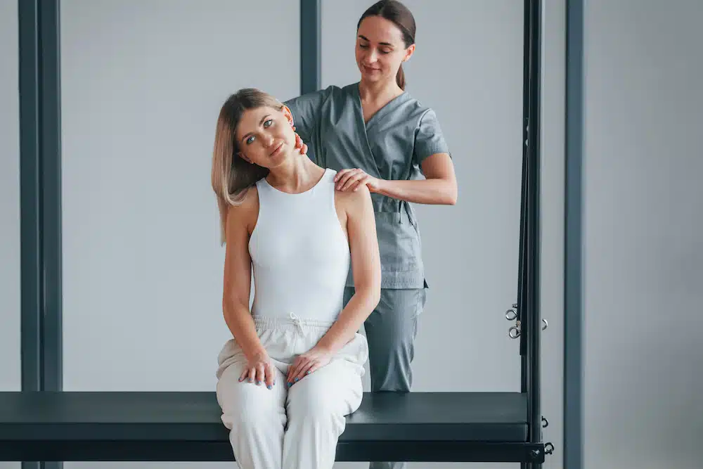 woman suffering from Fibromyalgia being examined