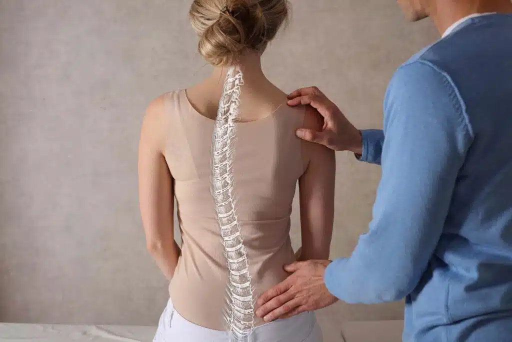 A woman having a checkup with her spine