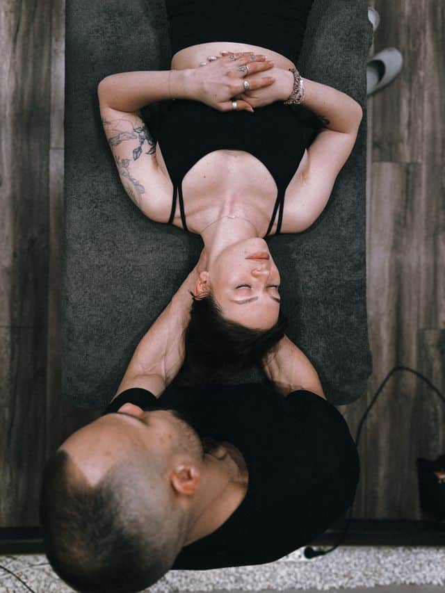 Chiropractor applying gentle cervical spine adjustment to treat whiplash and neck pain from an auto injury.